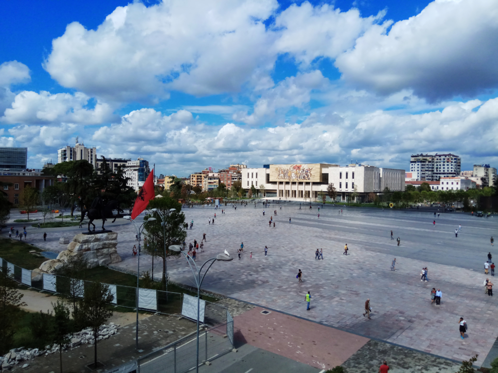 A photo of people walking in a ground in Albania 