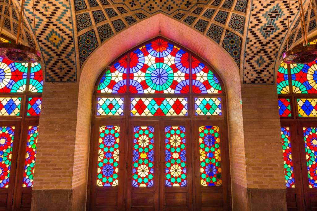 Colorful shining stained glass windows of Nasir Al-Mulk Mosque in Shiraz, Iran.