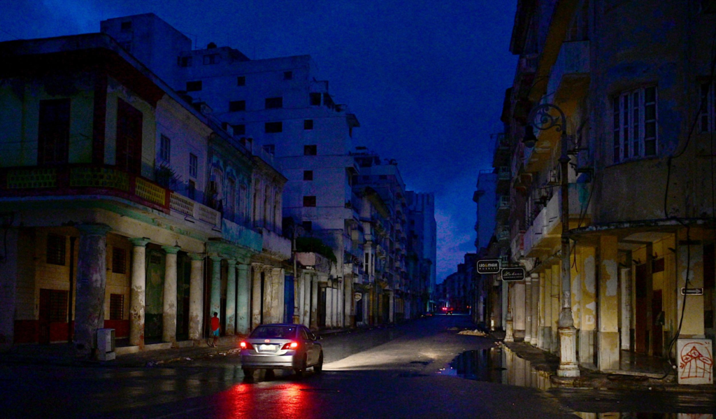 A street in Cuba having lightout in evening 