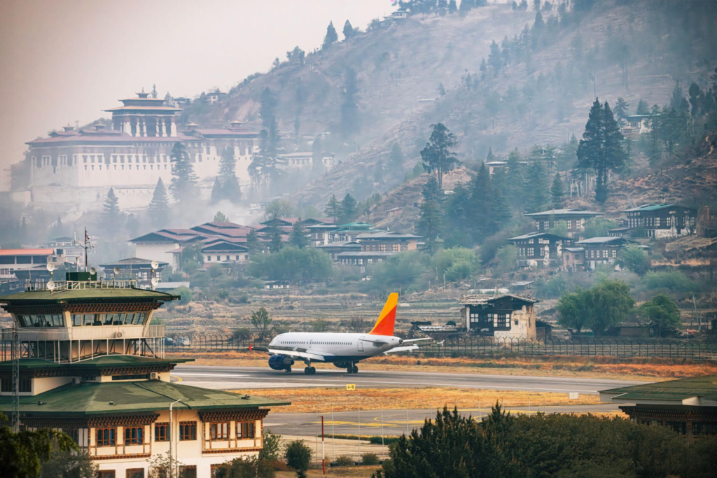 Airplane landing in Bhutan Paro International airport runway