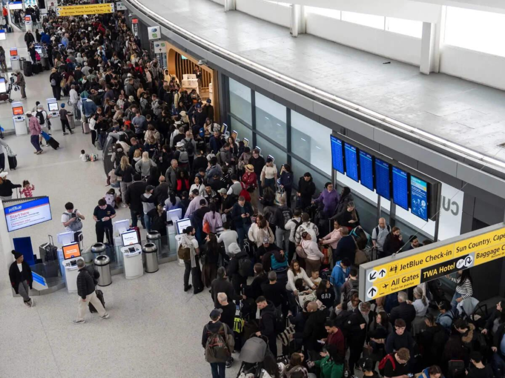 Long immigration queues at U.S. airport amid 2026 travel restrictions