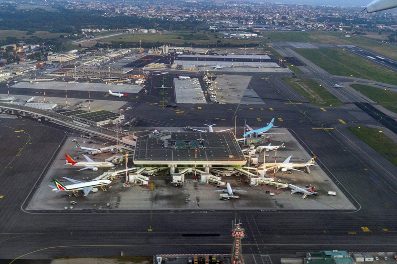 Aerial view of Rome Fiumicino Airport terminals and aircraft operations in Italy