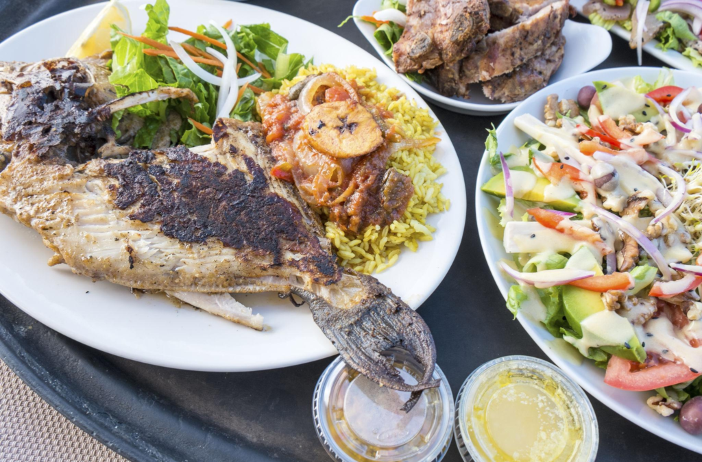 Barbecued Fish, Ribs, Salad and Rice