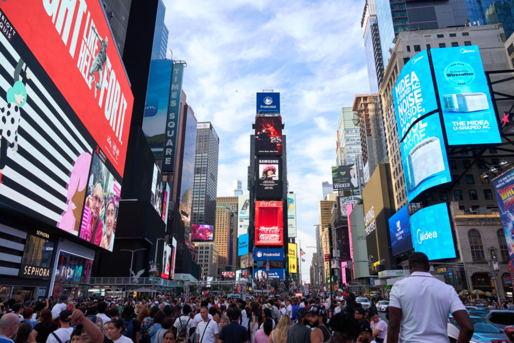 Tourists exploring Times Square during summer